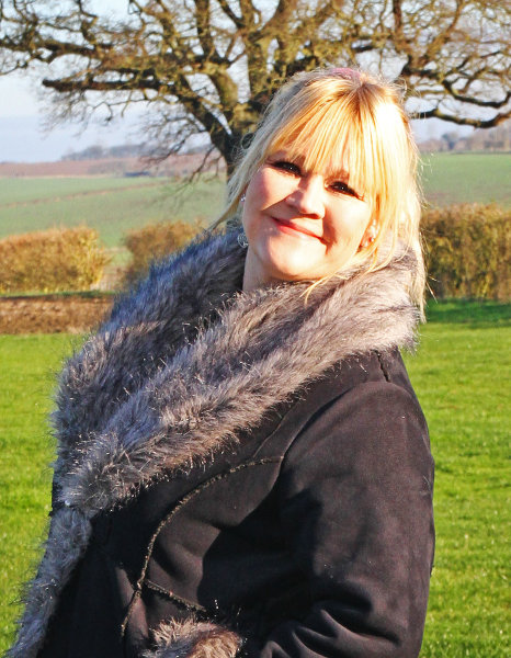 Stella Newman standing in a field